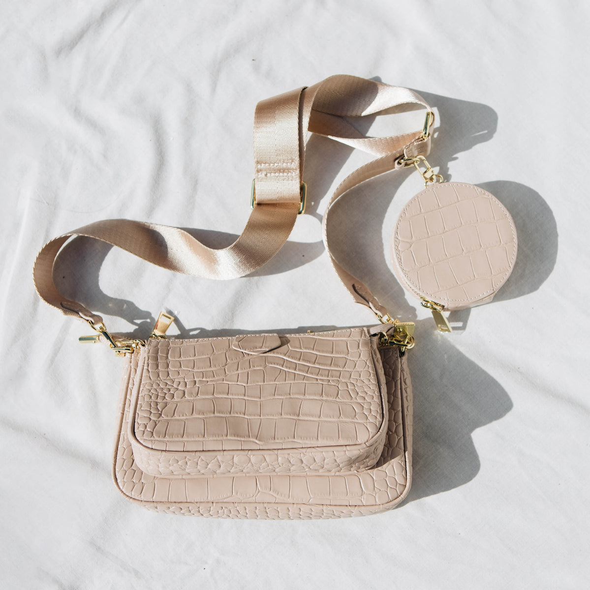 Nude leather store cross body bag